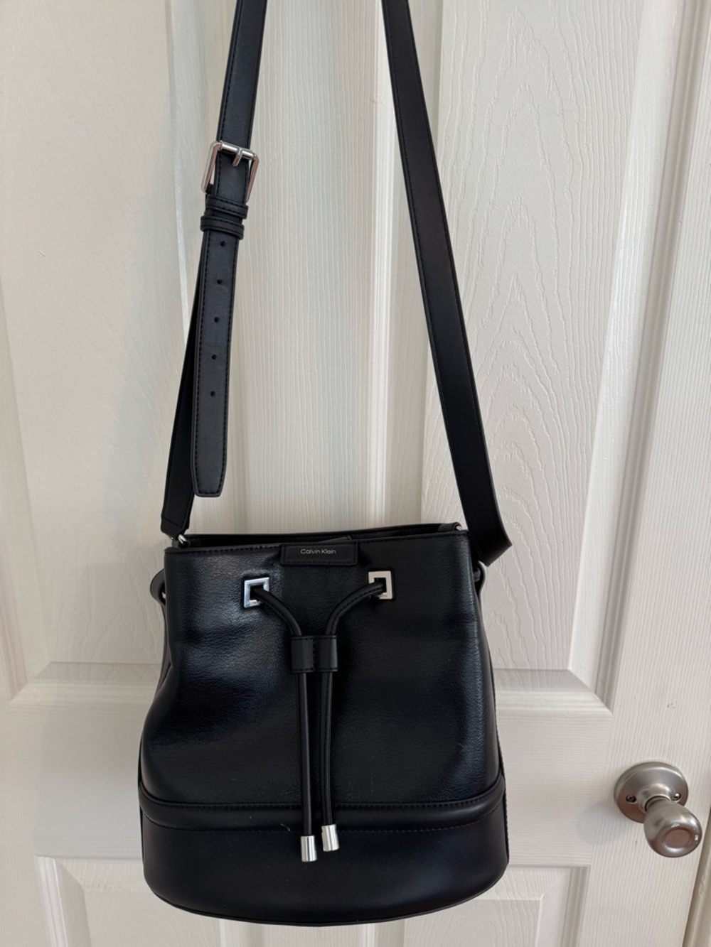 Calvin Klein Ash Drawstring Bucket Crossbody Bag in Black with Silver Hardware - Picture 10 of 13